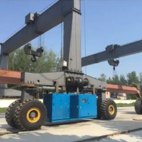Straddle Carrier lifting container in port terminal